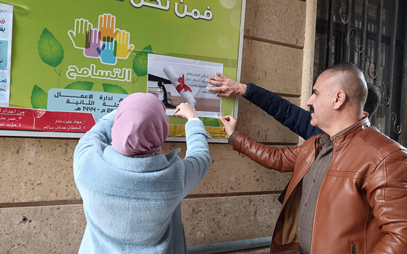 حملة تطوعية (الصاق بوسترات لحث الطلبة على القراءة)