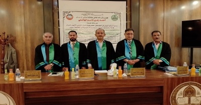 The Dean of the College of Agriculture chairs a committee discussing a master’s thesis at the University of Mosul