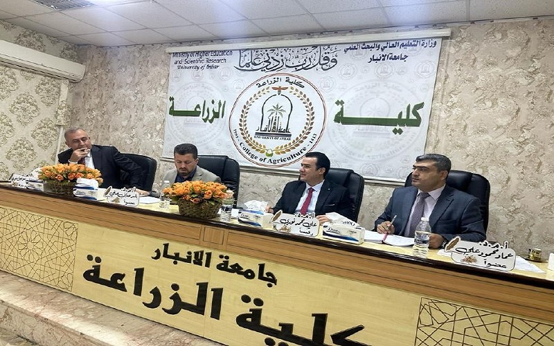 A lecturer at the College of Agriculture chairs a committee discussing a master’s thesis at Anbar University.