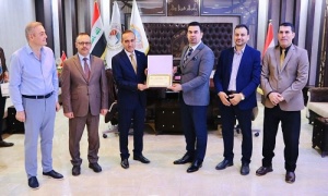 جامعة كركوك تنظم ندوة عن التصنيفات العالمية ورئيسها يكرم لجنة تصنيف التايمز العالمي