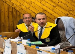 تدريسي من كلية الآداب عضواً بلجنة مناقشة أطروحة دكتوراه بجامعة تكريت