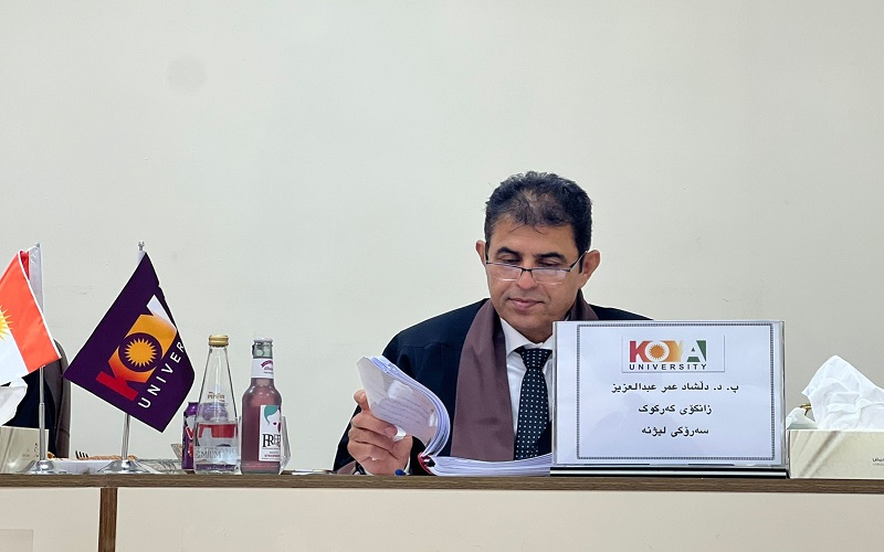 A faculty member at the College of Arts heads a master's thesis discussion committee at Koya University