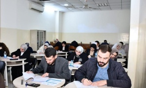 In an academic atmosphere .. Graduate students at the University of Kirkuk perform their exams for the first semester