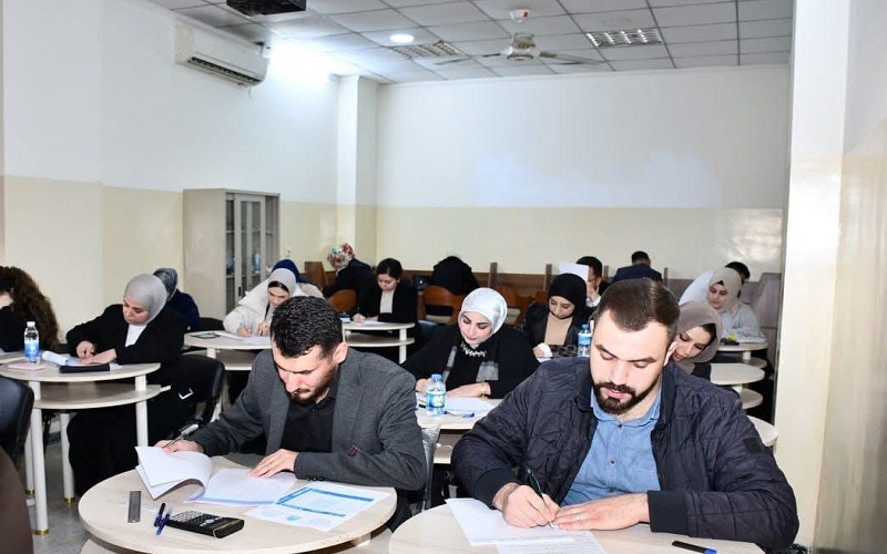 In an academic atmosphere .. Graduate students at the University of Kirkuk perform their exams for the first semester