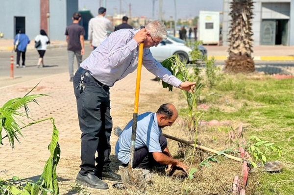 Implementation of the government program.. The University of Kirkuk holds a tree planting campaign