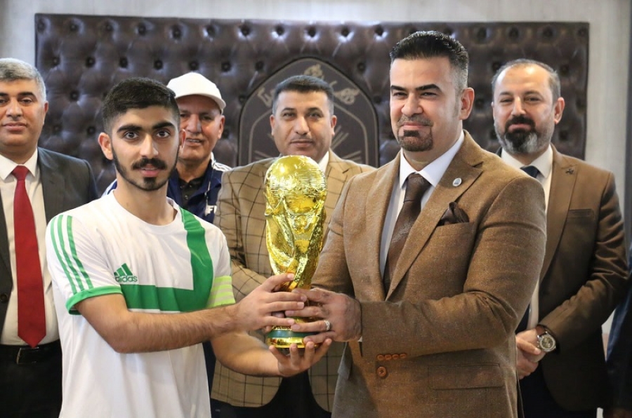 To encourage University sports, the President of  University of Kirkuk honors the five players football championship-winning team