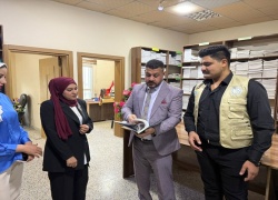 College of Education for Pure Sciences Staff Donate Books to the College Library