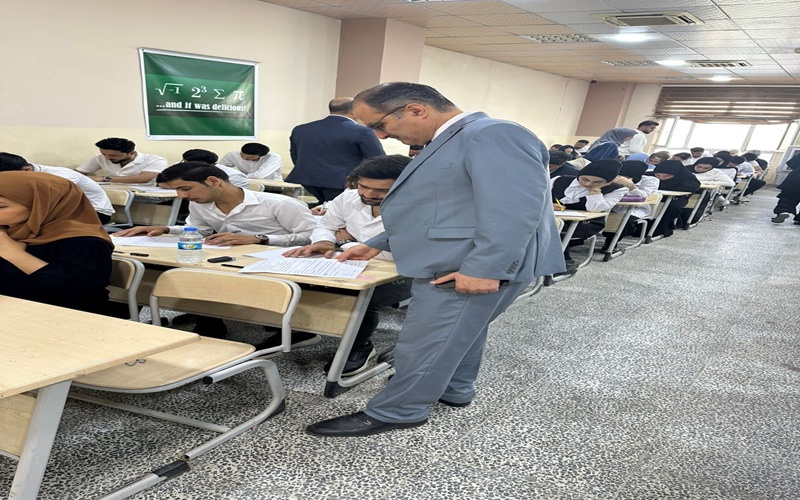 The Dean of the College of Education for Pure Sciences inspects the progress of exams
