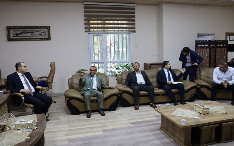 The Dean of the College of Education for Pure Sciences receives the Assistant President of the University for Administrative Affairs3