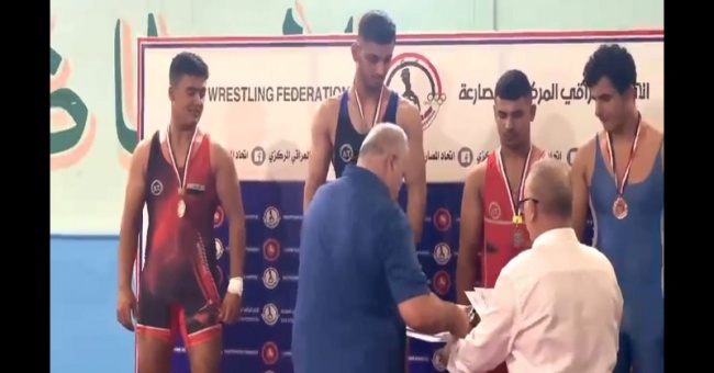 A student at the College of Science wins first place in the Iraqi youth Greco-Roman wrestling club championship