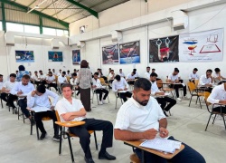 The Dean of the College inspects the examination halls for first-year students.