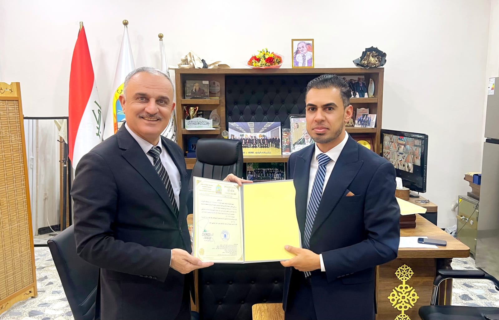 تدريسي ورئيس فرع العلوم النظرية في كلية التربية البدنية وعلوم الرياضة يحصل على ترقية أكاديمية