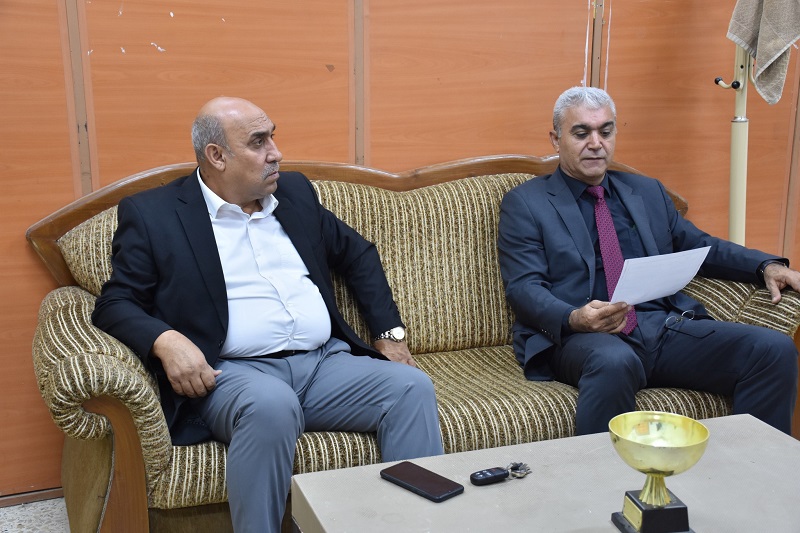 The Dean of the College of Physical Education and Sports Sciences holds a meeting with members of the Scientific Committee