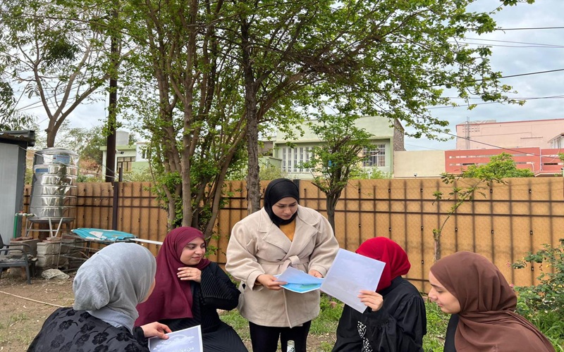 كلية التربية للبنات في جامعة كركوك توزّع بوسترات توعوية